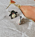 Silver studs penguins