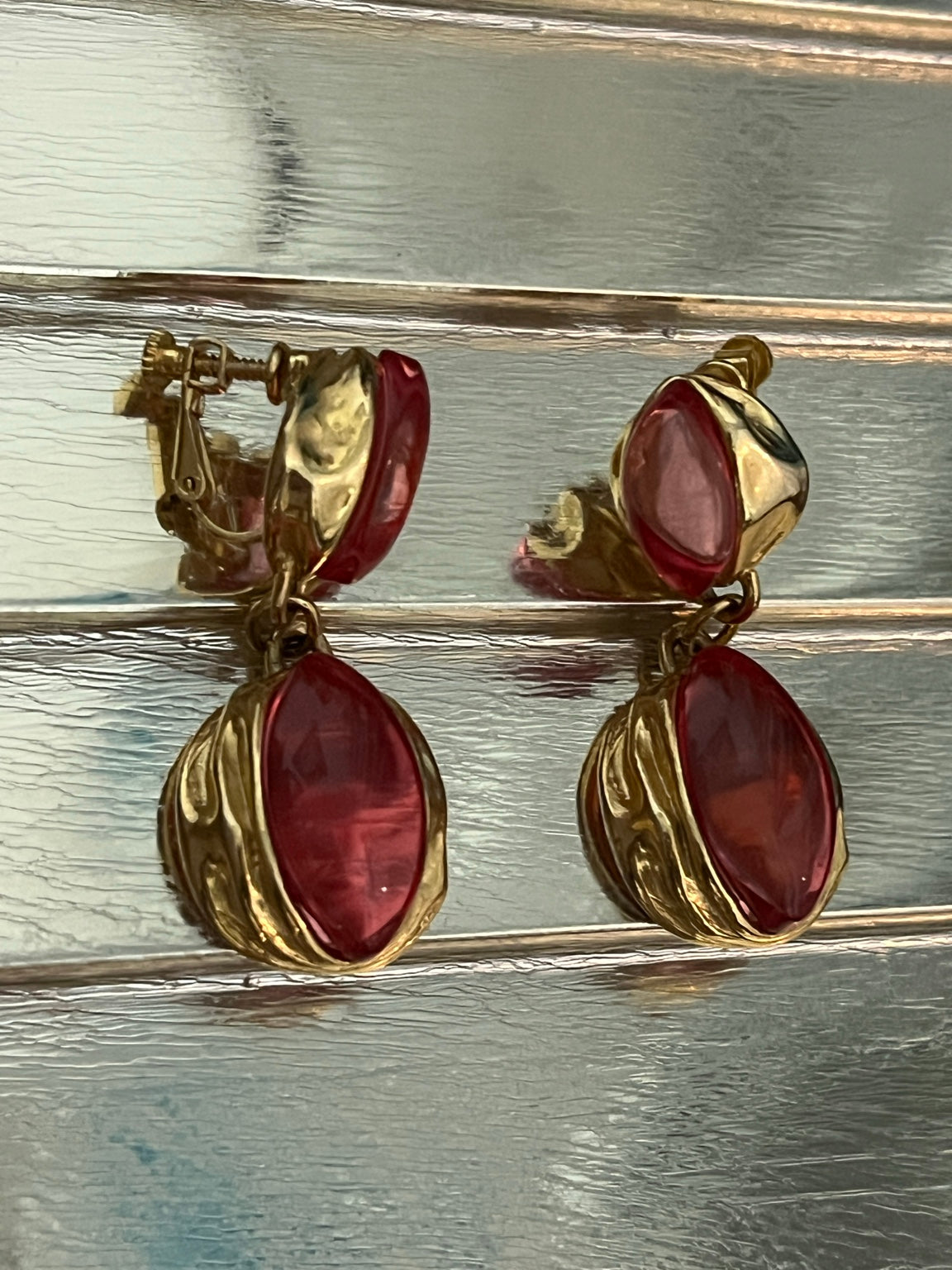 Vintage Napier Milano red cabochon clip-on earrings — side view