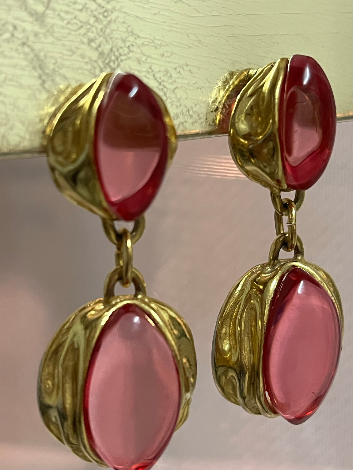 Vintage Napier Milano red cabochon clip-on earrings — close-up